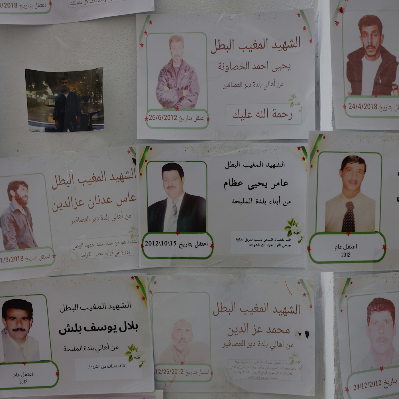 Postings on a wall of missing people